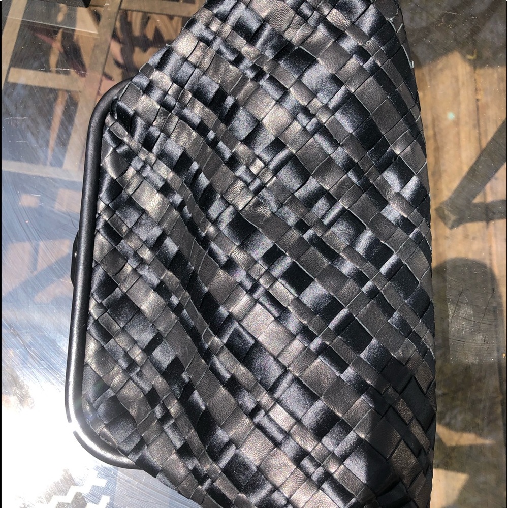 Calvin Klein leather and satin woven clutch